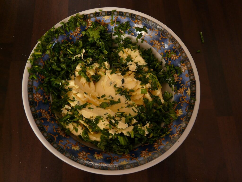 herb butter, butter in a bowl. 